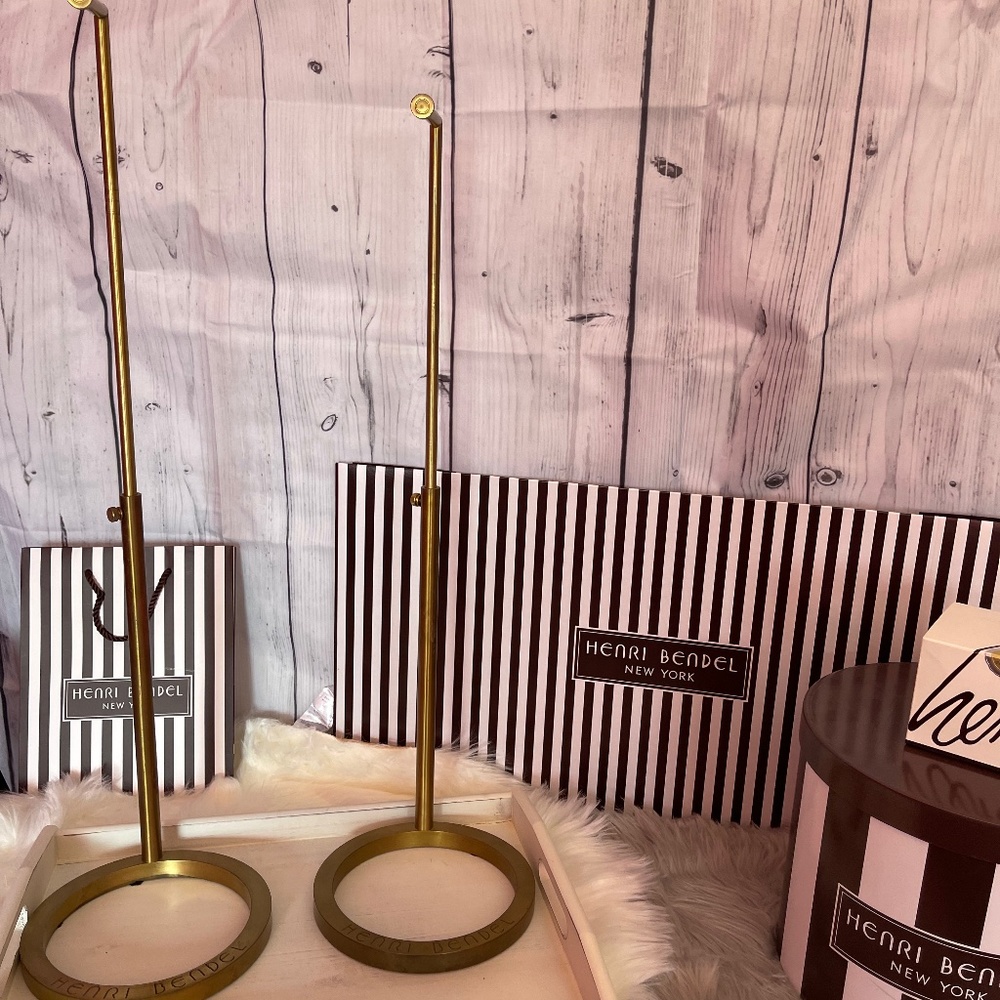 Henri Bendel solid brass adjustable bag display holders